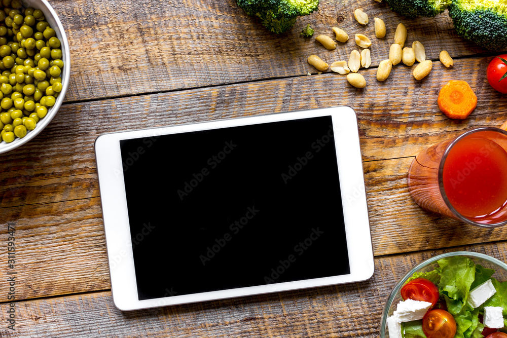 concept diet and tablet with vegetables mock up