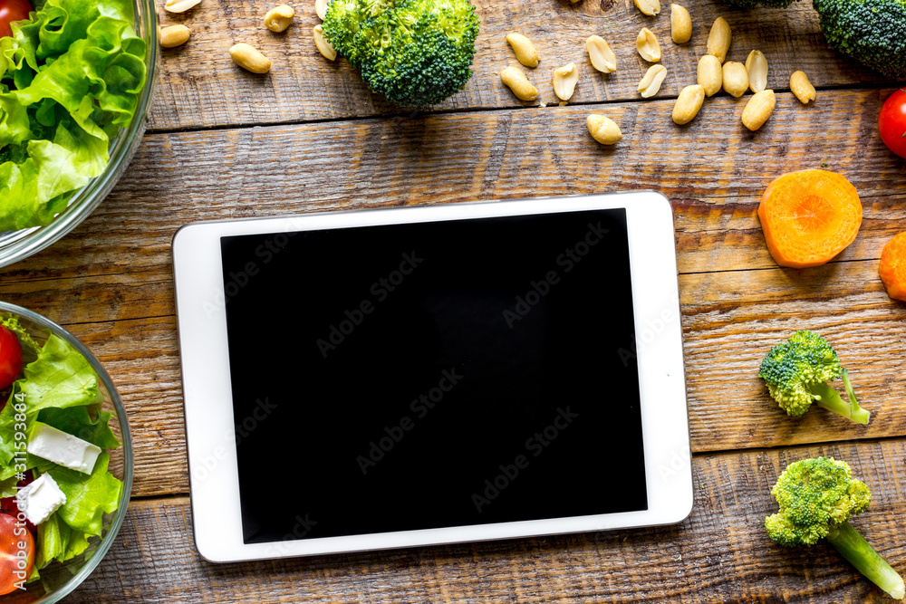 concept diet and tablet with vegetables mock up