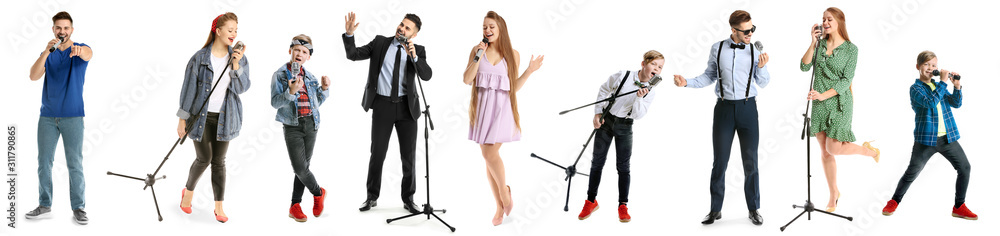 Handsome male singer with microphone on white background