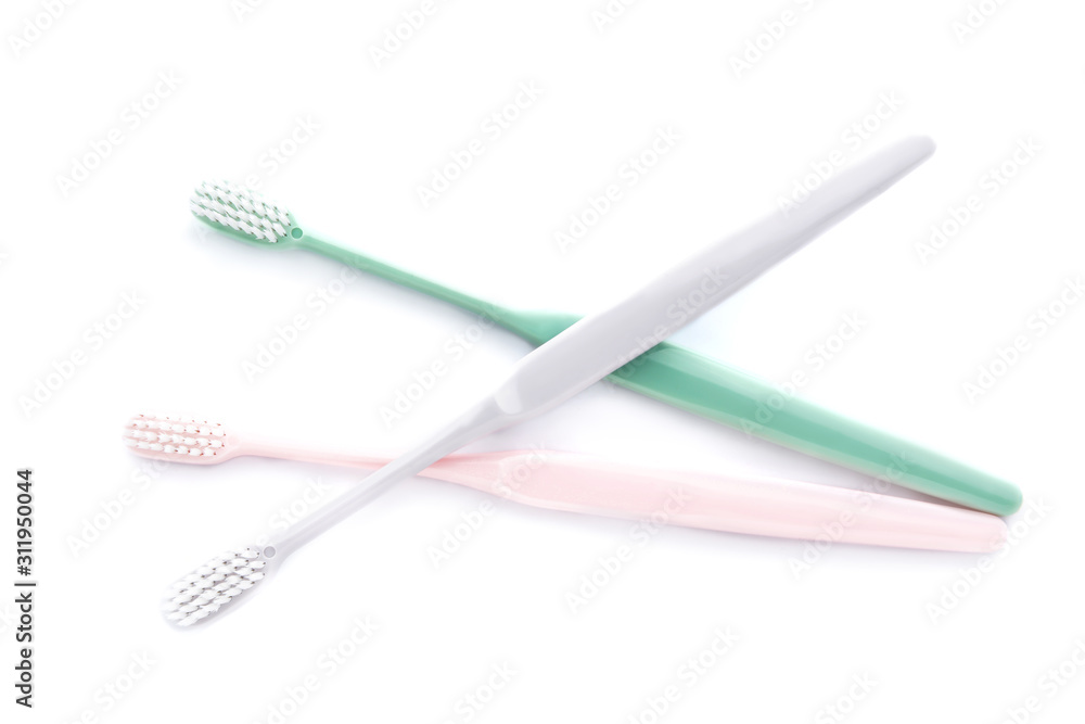 Tooth brushes on white background