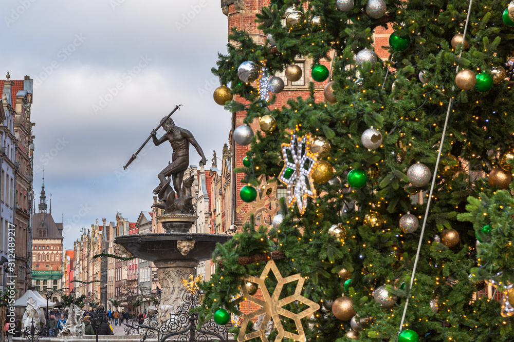 Long Lane and Neptune fountain in Gdansk with beautiful Christmas tree, Poland