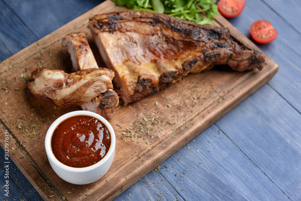 Composition with tasty barbecue sauce and meat on table