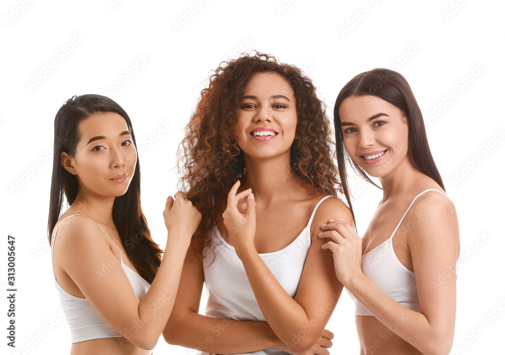 Beautiful young women with healthy skin on white background