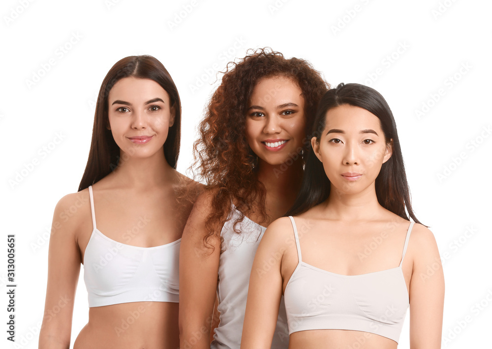 Beautiful young women with healthy skin on white background