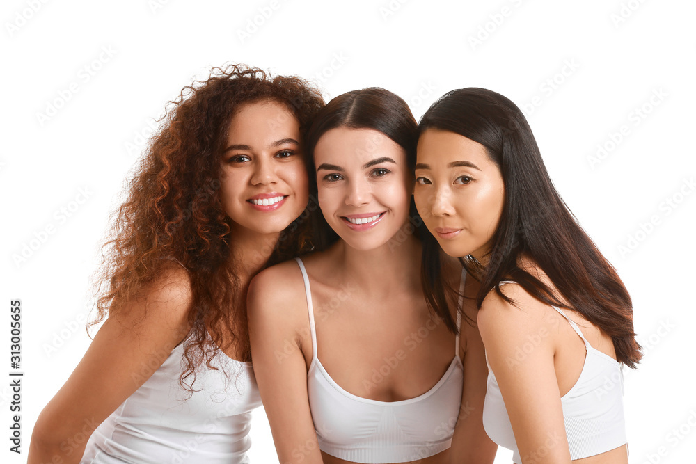 Beautiful young women with healthy skin on white background