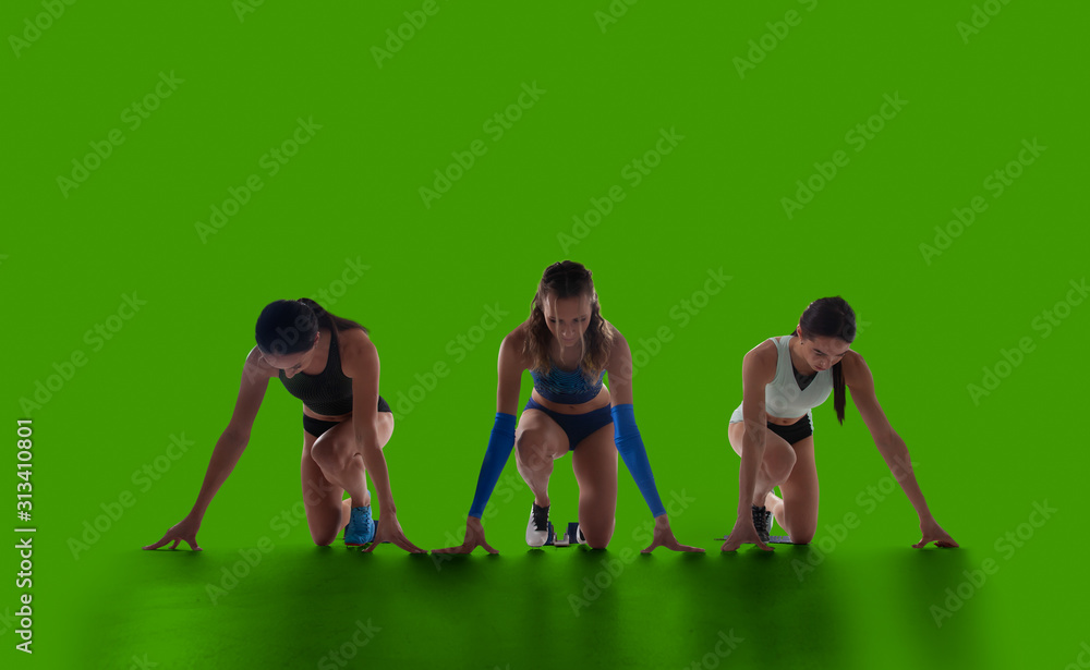 Female athlete isolated on green screen.