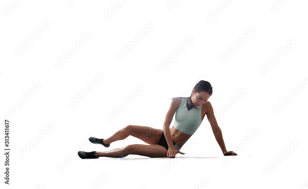 Female athlete isolated on white.