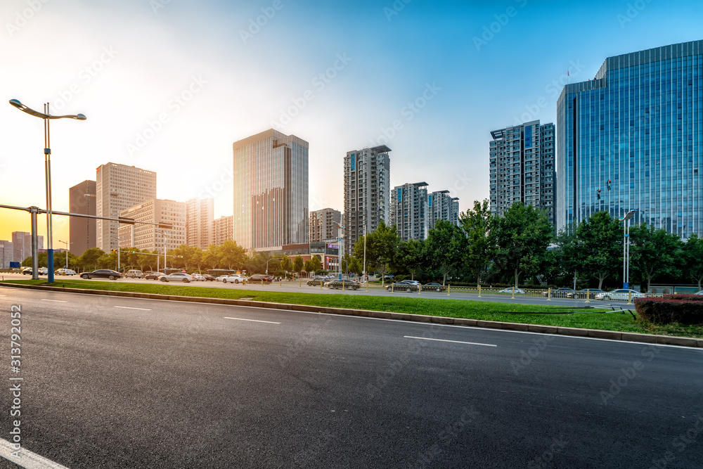 Road pavement and modern building in Jinan financial district