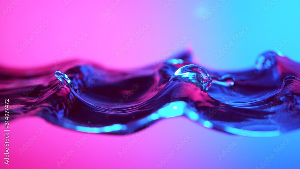 Detail of water waves in neon lights