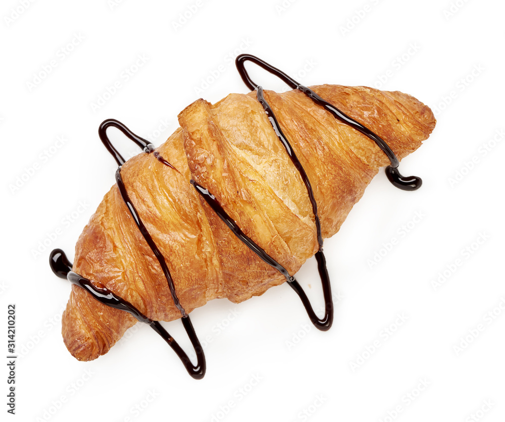 Fresh croissant with chocolate sauce on a white background. Top view.