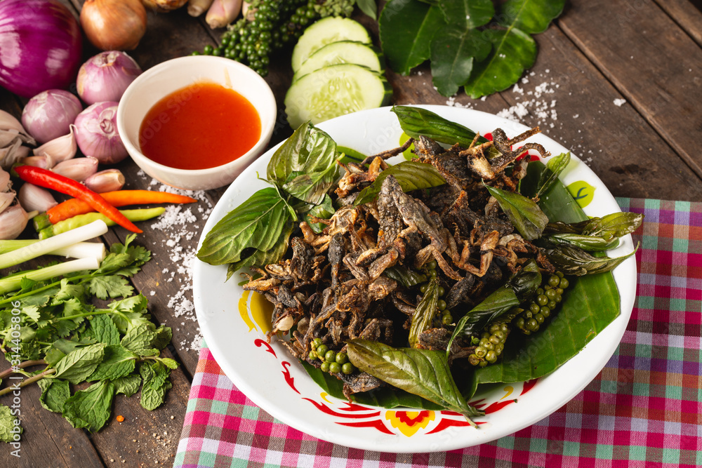 Fry species of a small green frog, Thai Esan local food, Thailand