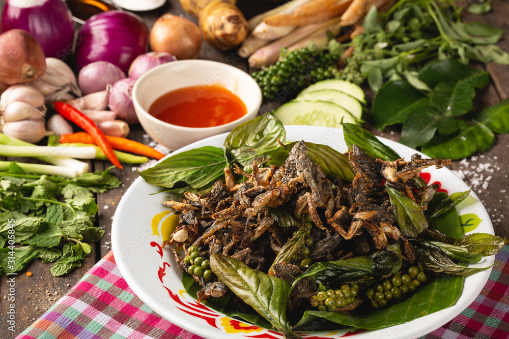 Fry species of a small green frog, Thai Esan local food, Thailand