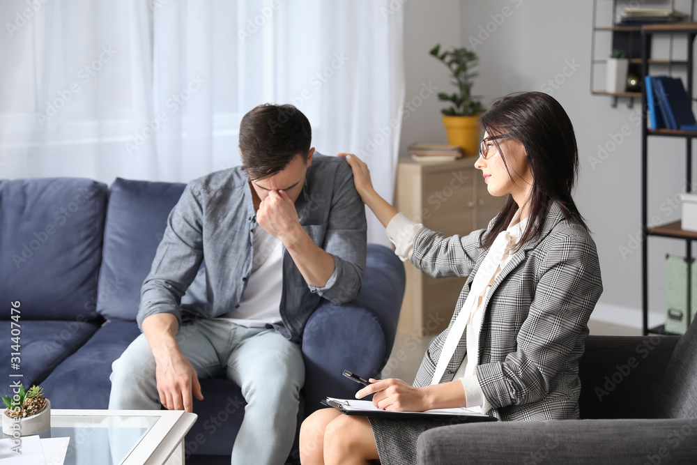 Psychologist working with patient in office