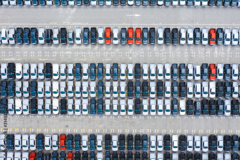 Top view of row new cars in logistic port export terminal