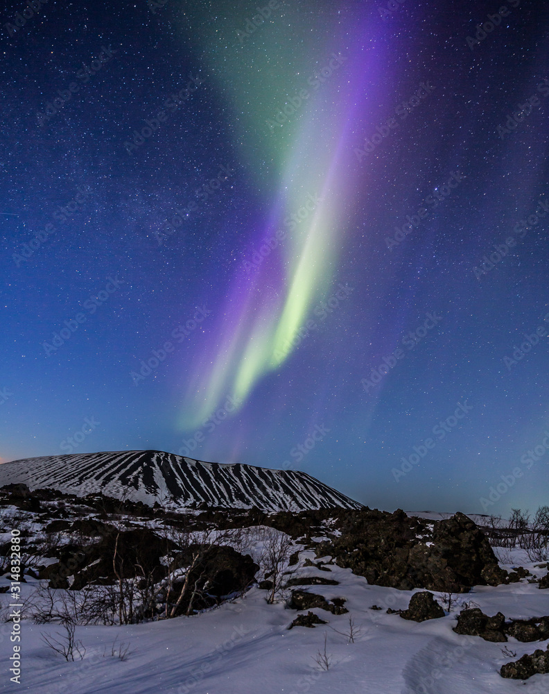 Northern lights above an arctic landscape 