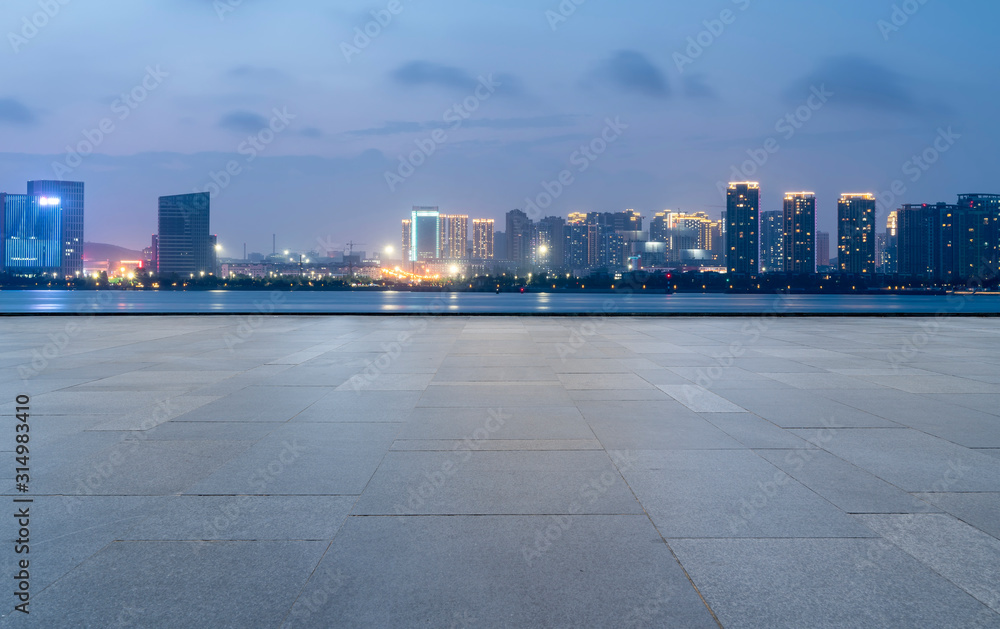 Road surface and urban architectural landscape skyline