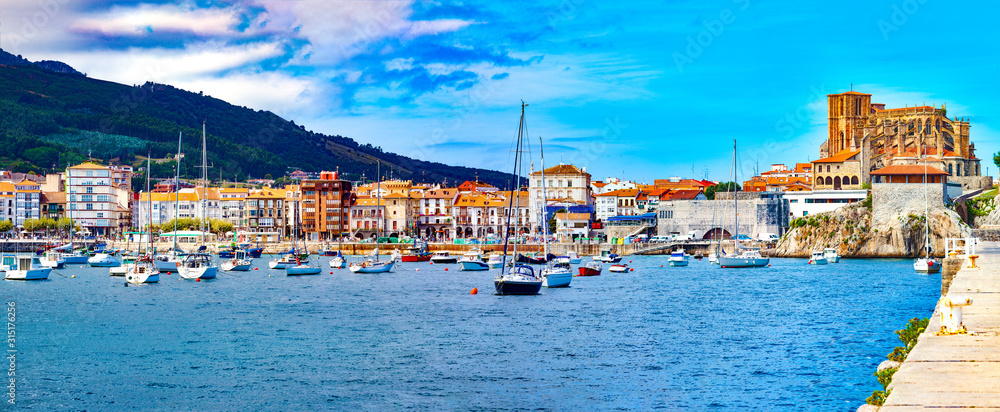 Coastal towns of Spain.Castro Urdiales.Cantabria.Fishing village and Boat dock. Scenic seascape.tour