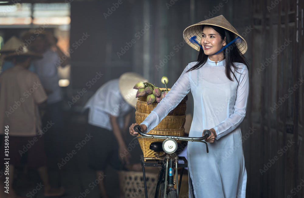 Beautiful woman with Vietnam culture traditional ,vintage style,Hoi an Vietnam