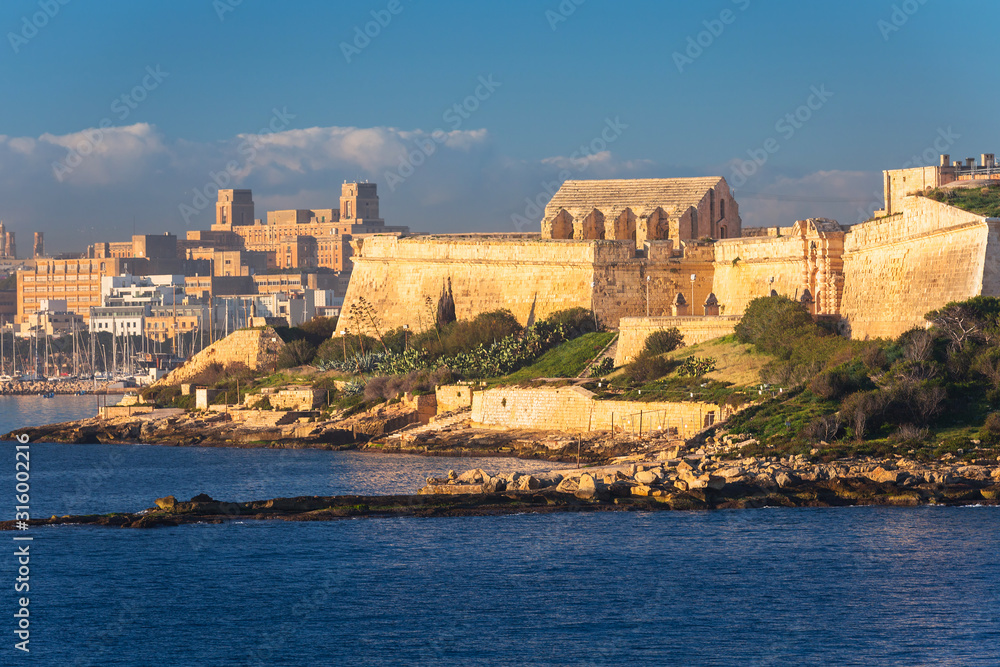 Fort Manoel on the Manoel island in Gzira at sunrise, Malta.