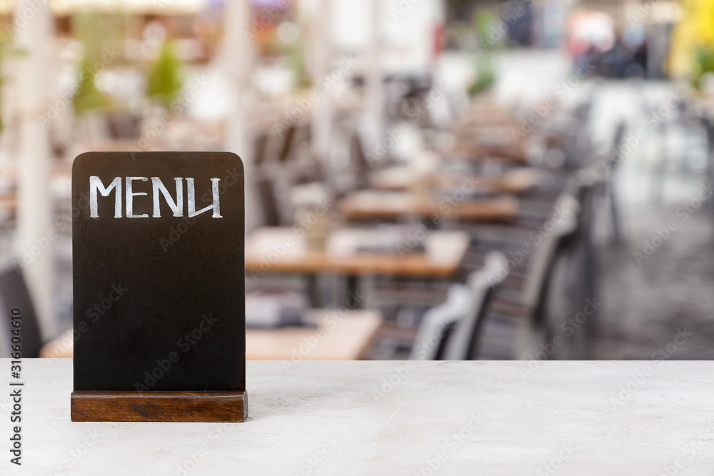 Blank menu on table outdoors