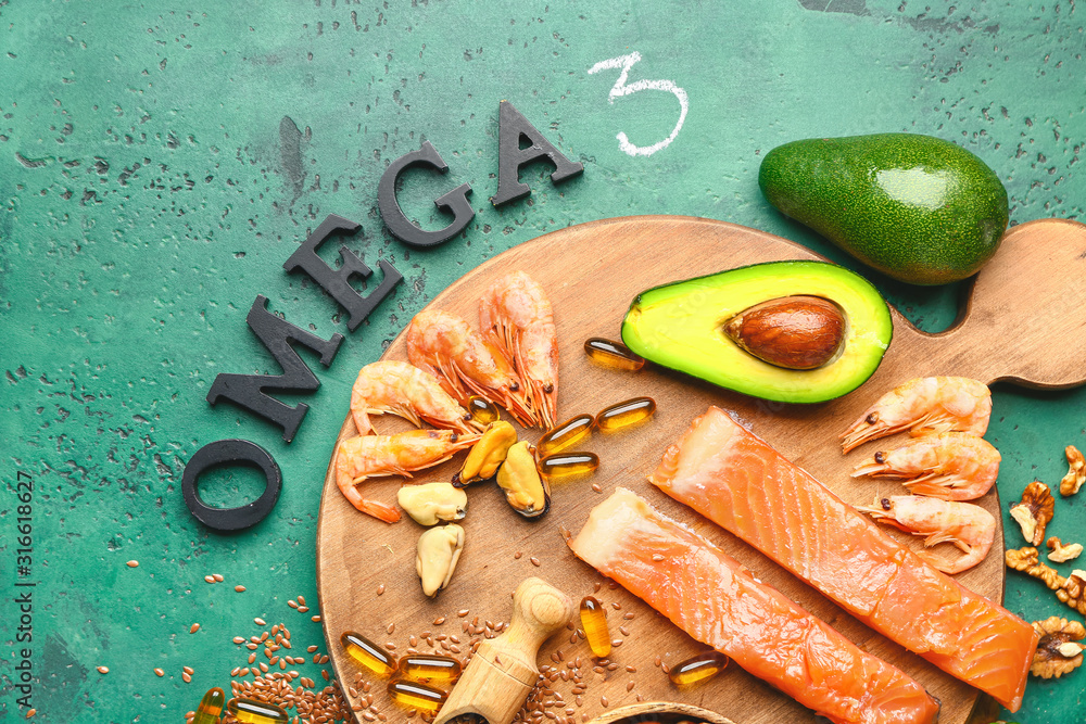 Set of healthy products with high omega 3 and fish oil pills on color background