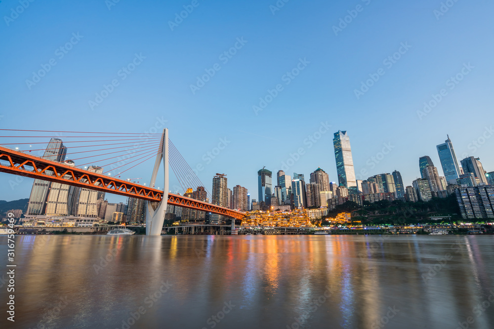 Night view of Hongyadong and skyline along Jialing River in Chongqing, China