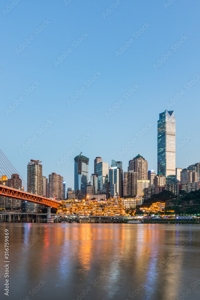 Night view of Hongyadong and skyline along Jialing River in Chongqing, China