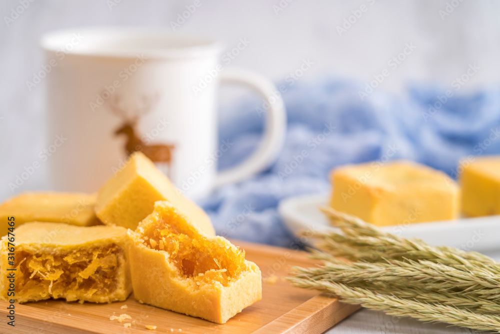 A few pieces of delicious Chinese pineapple cake in a tray