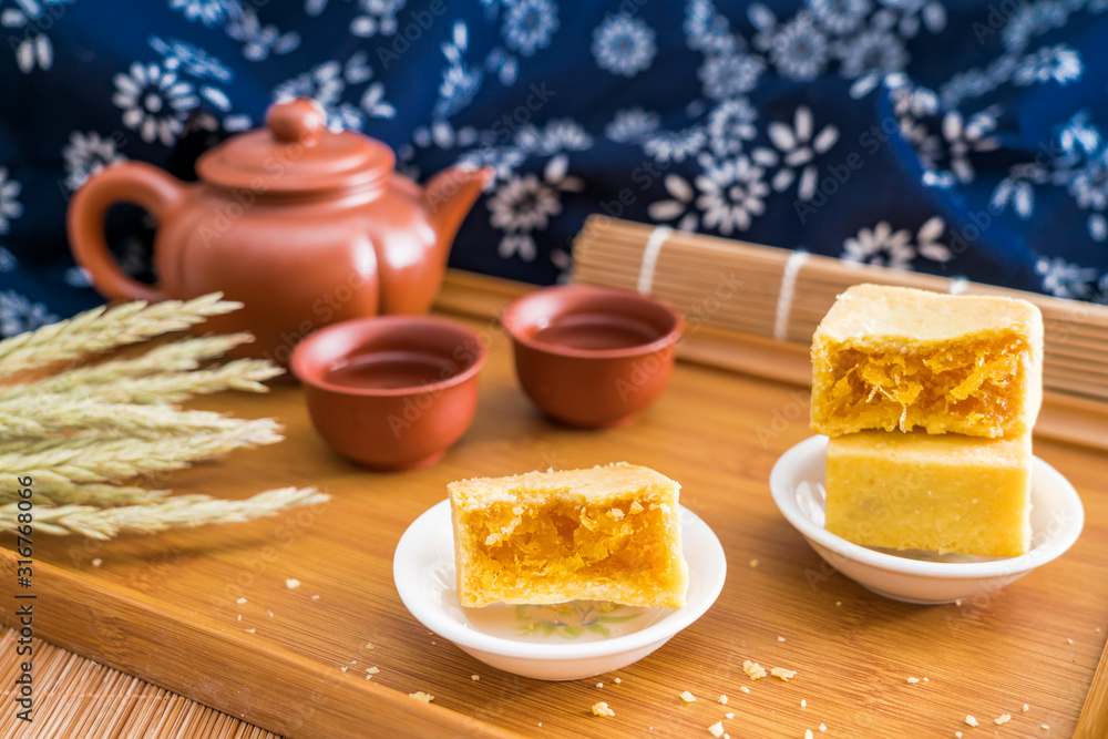 A few pieces of delicious Chinese pineapple cake in a tray