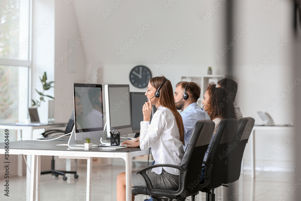 Technical support agents working in office