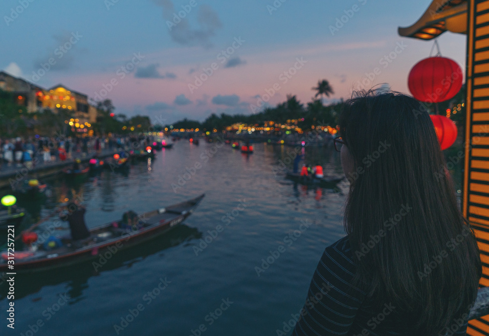 woman in Hoi An ancient town