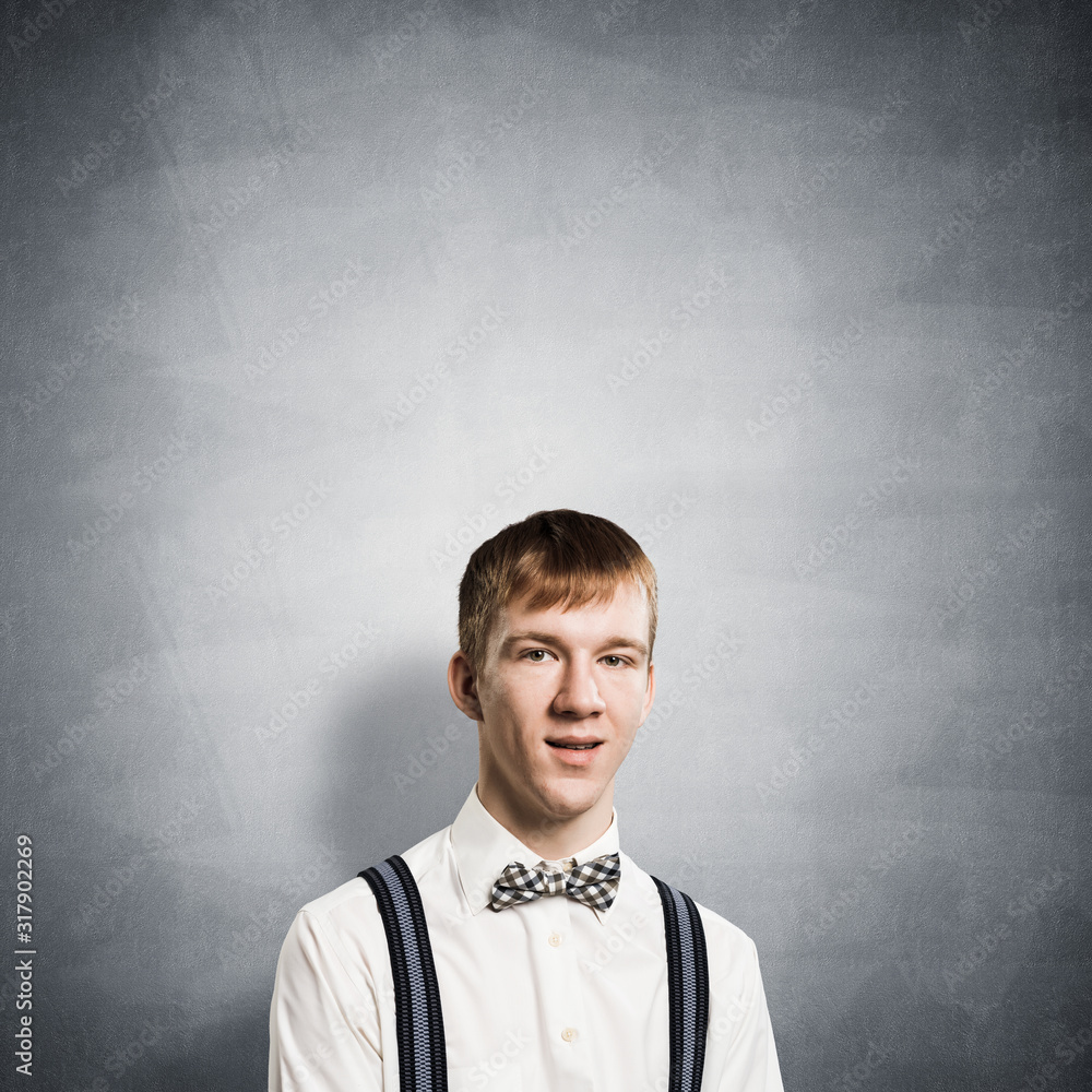 Smiling teenager with satisfied and pleasant look