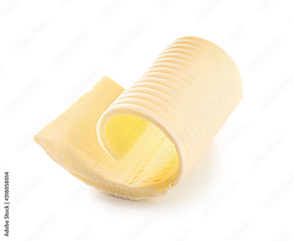 Curl of fresh butter on white background