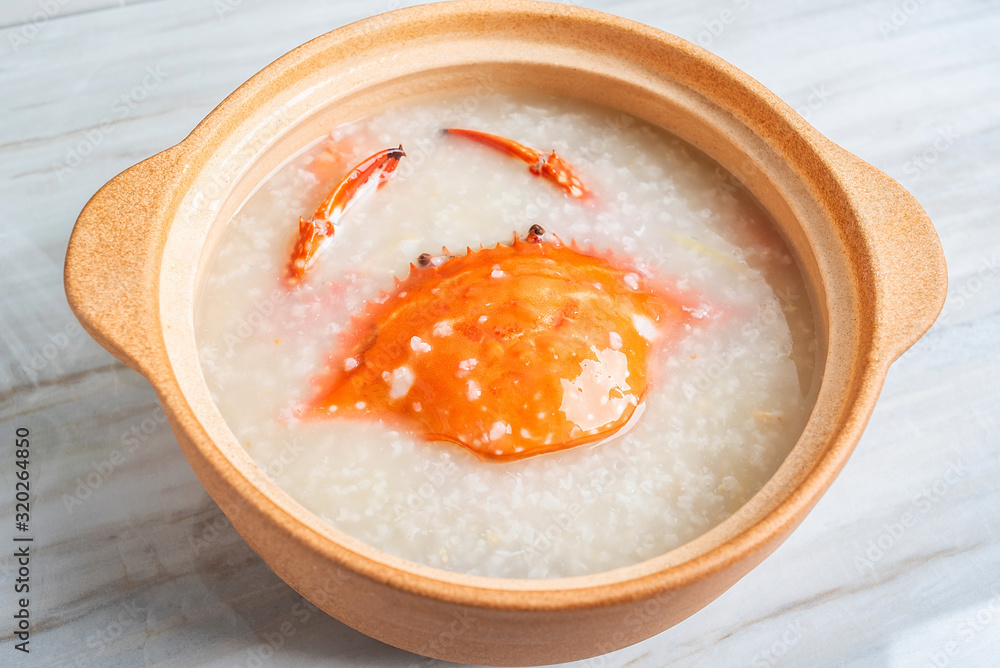 Chinese Chaoshan casserole porridge, a pot of shrimp and crab seafood porridge on the kitchen counte