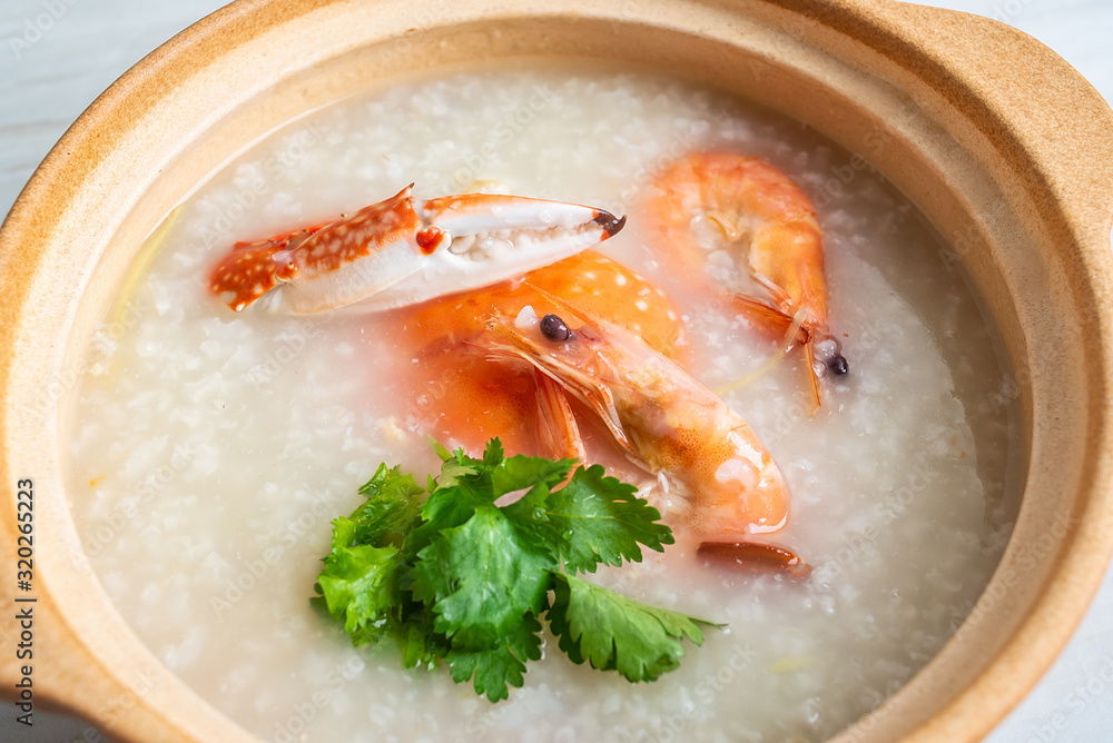 Chinese Chaoshan casserole porridge, a pot of shrimp and crab seafood porridge on the kitchen counte