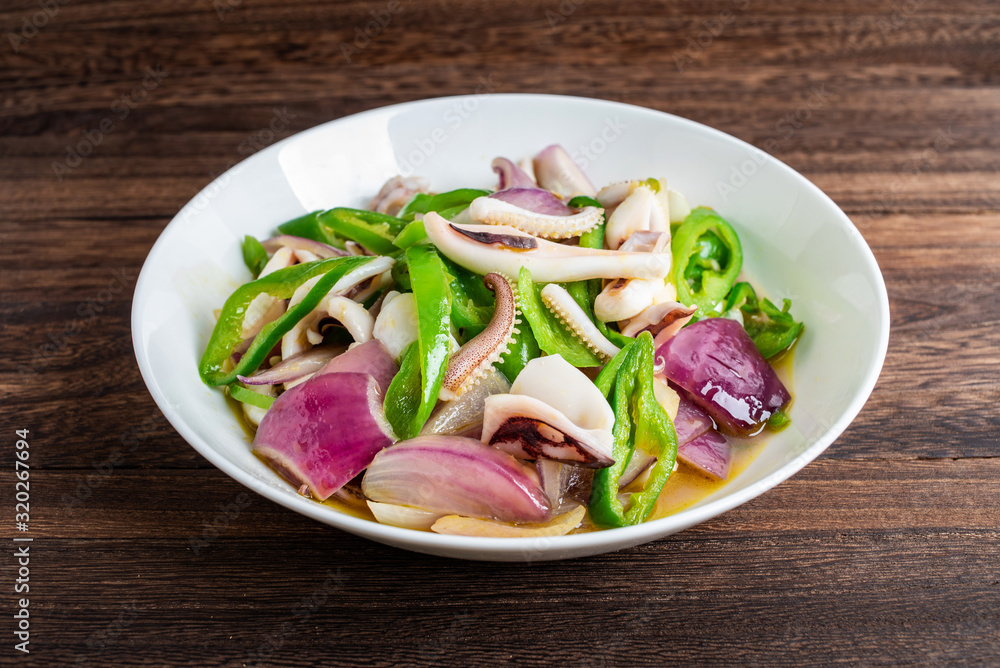 Chinese regular dish fried squid with onion and green pepper