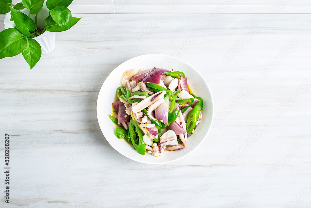 Chinese regular dish fried squid with onion and green pepper