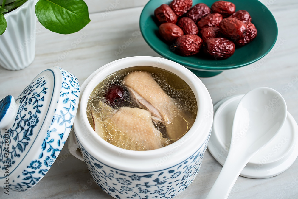 Chinese health tonic soup, stewed chicken soup with red dates