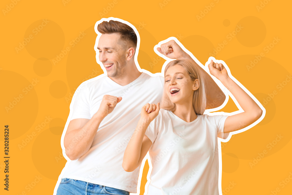 Happy dancing young couple on color background