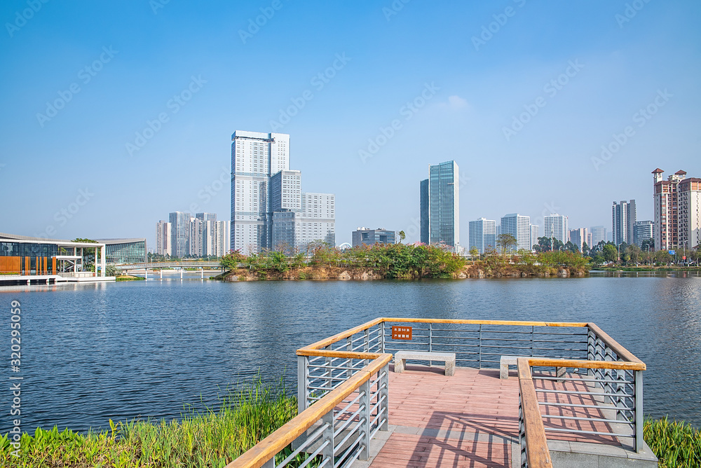 Scenery of CBD buildings and Fenghuang Lake Park in Nansha District, Guangzhou, China