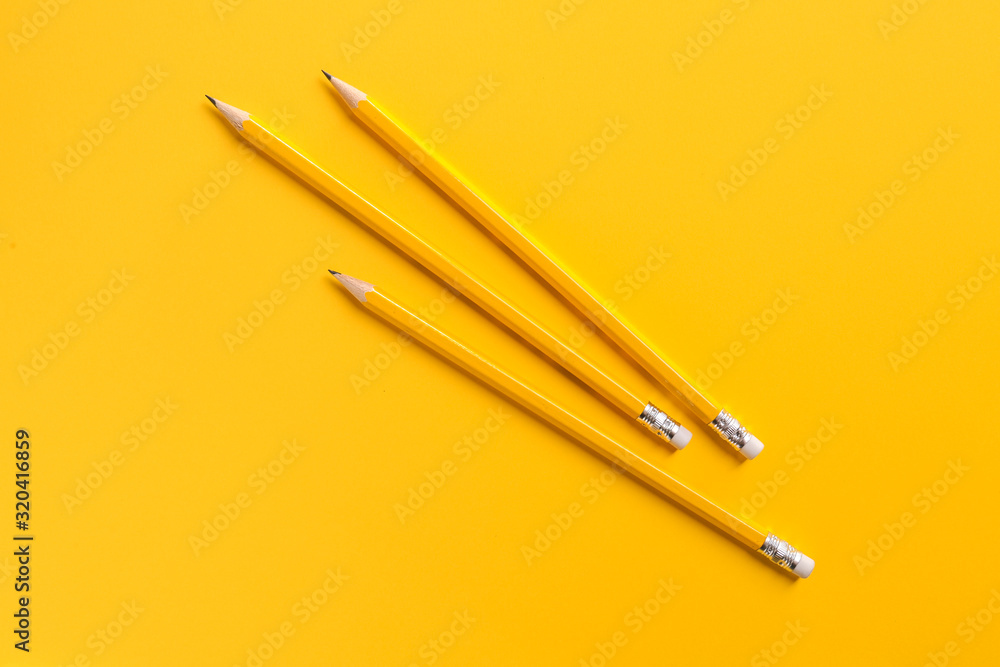 Ordinary pencils on color background