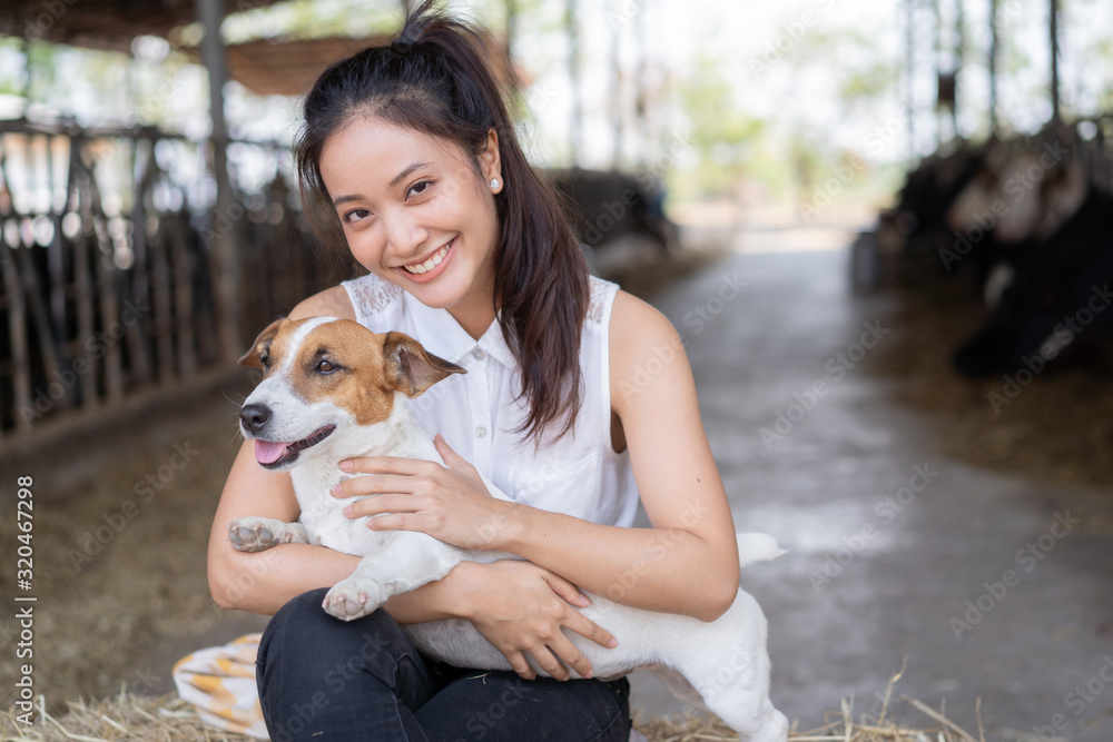 Cow farmer with her dog