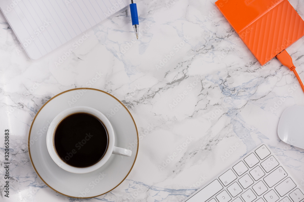 Black coffee on the desk with a computer, mouse Keyboard, book note, and pen Concept of working at h