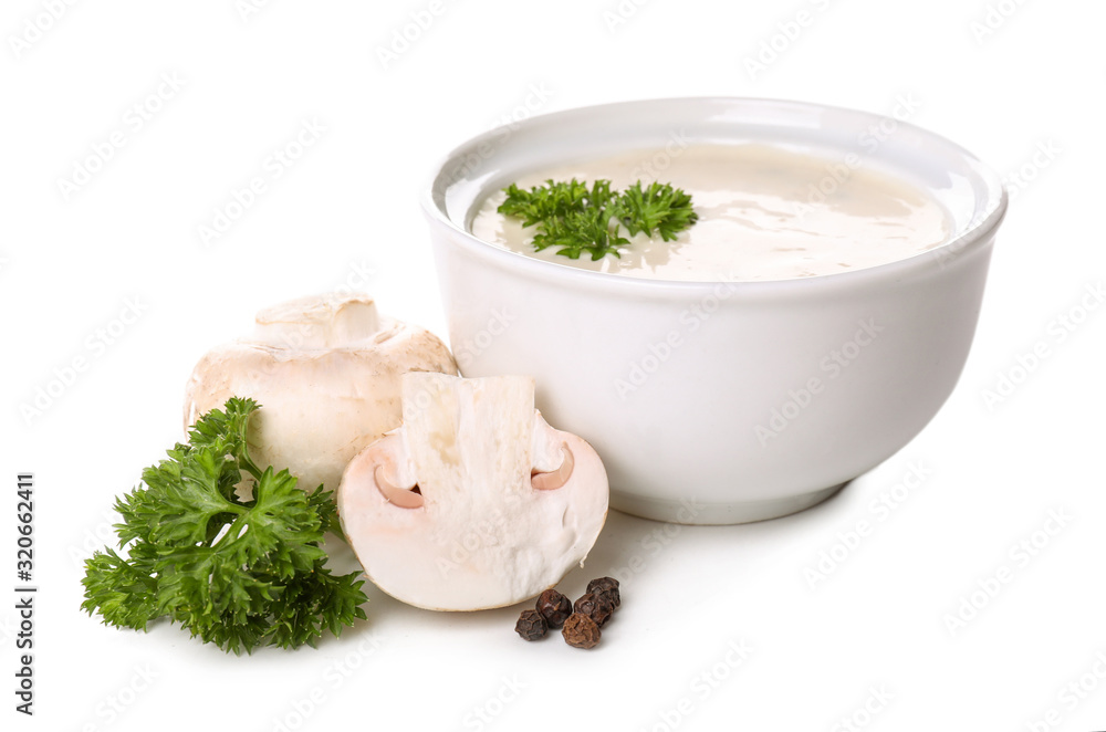 Bowl with tasty mushroom sauce on white background