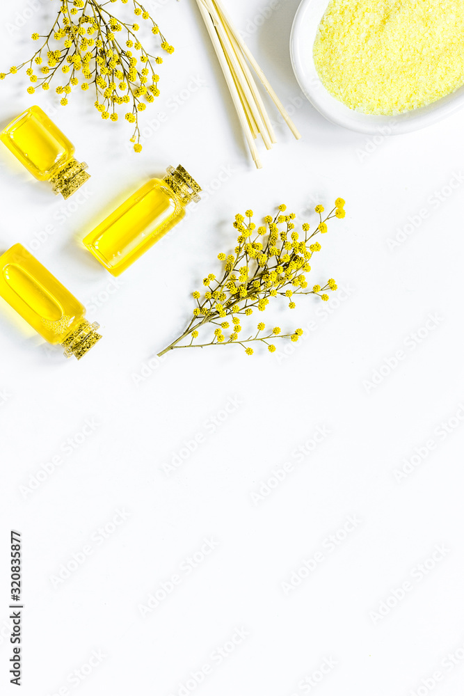 Yellow cosmetic set for body care on white background top view