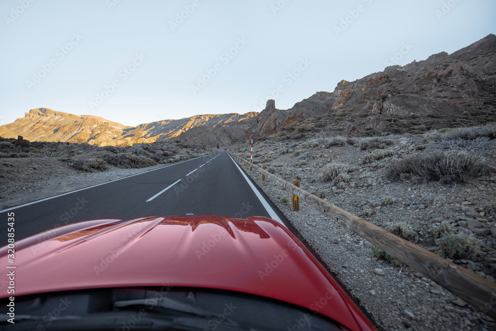 View on the beautiful road on the volcanic valley from the car during a travel