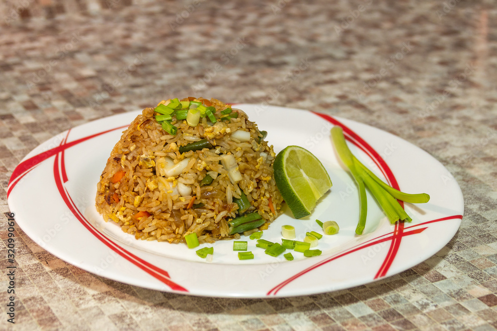 The photo shows a traditional Thai dish fried rice. You can cook it yourself with your favorite ingr