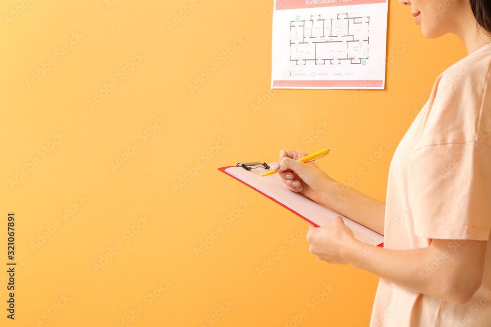 Fire safety specialist inspecting building