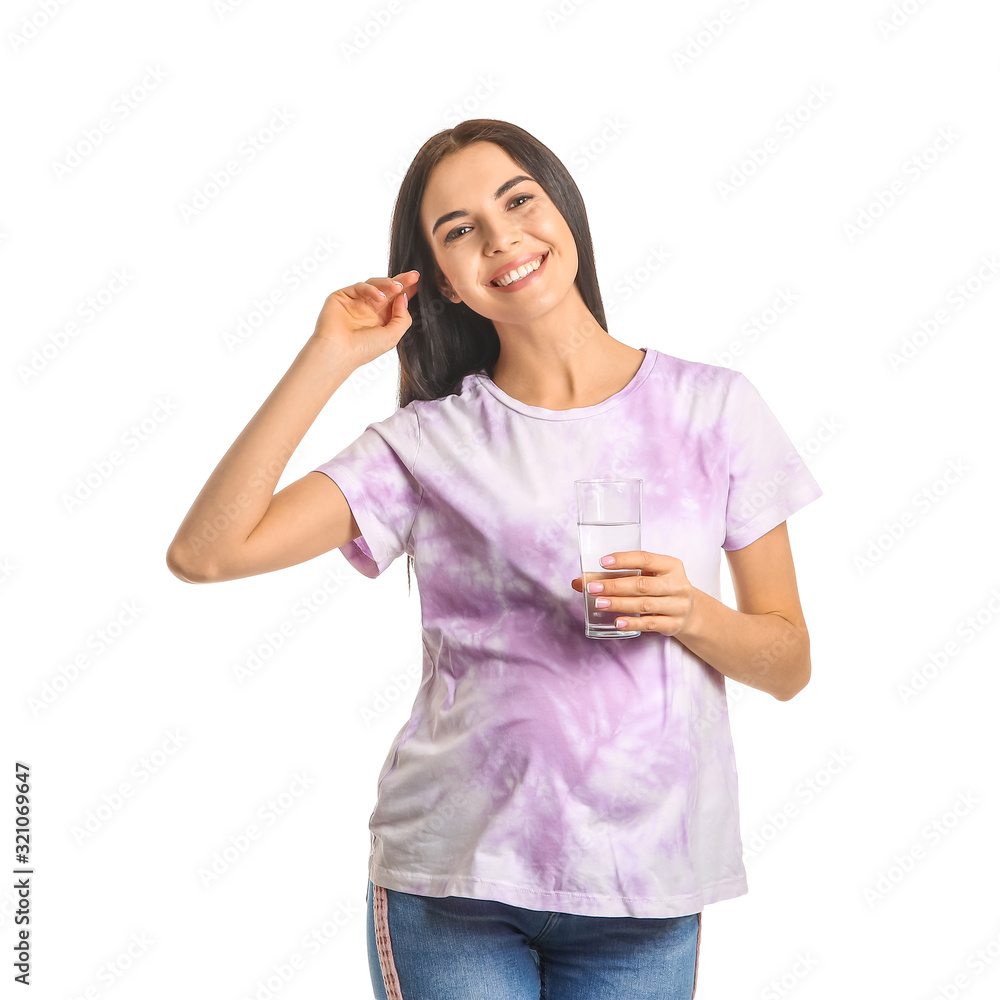 Beautiful pregnant woman with glass of water on white background