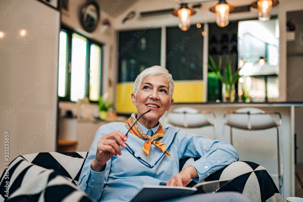 Portrait of a pensive senior woman at home.